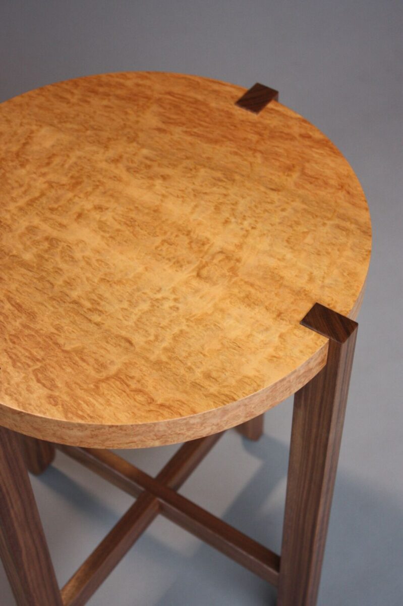 This elegant table is built with Walnut and Eukalyptus burl